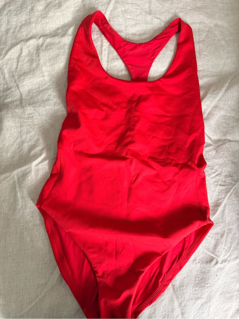Left on Friday Red One piece Racerback NEVER WORN